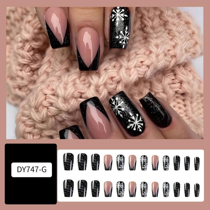Winter-themed nail art: Elegant snowflake-embellished nail tips, sweet and gentle nail stickers.